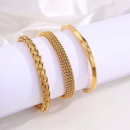 Braccialetti Unisex in Acciaio 304 Placcati Oro 18K – 3 pezzi, design sportivo minimalista, resistenti e versatili per ogni outfit.